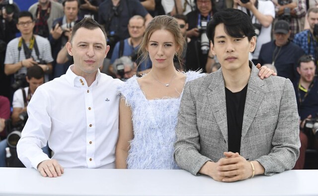 (From L-R) Actors Roma Zver, Irina Starshenbaum and Teo Yoo pose for photographers during a photo call for the film Leto at Cannes. Photo by Arthur Mola/Invision/AP (From L-R) Actors Roma Zver, Irina Starshenbaum and Teo Yoo pose for photographers during a photo call for the film Leto at Cannes. Photo by Arthur Mola/Invision/AP