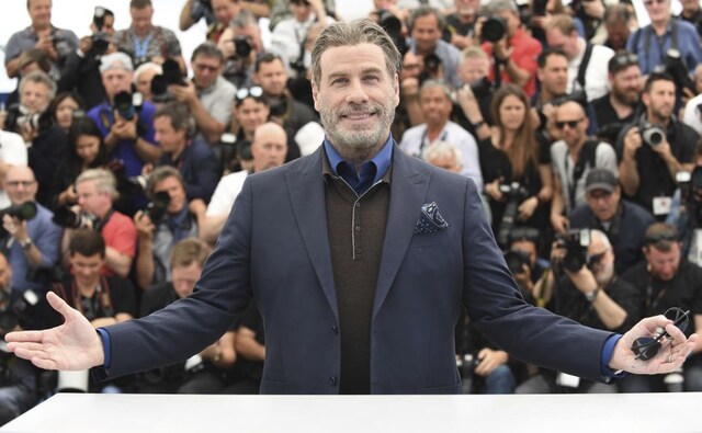 Actor John Travolta poses for photographers during a photo call for the film Gotti at the 71st international film festival, Cannes. Photo by Arthur Mola/Invision/AP Actor John Travolta poses for photographers during a photo call for the film Gotti at the 71st international film festival, Cannes. Photo by Arthur Mola/Invision/AP