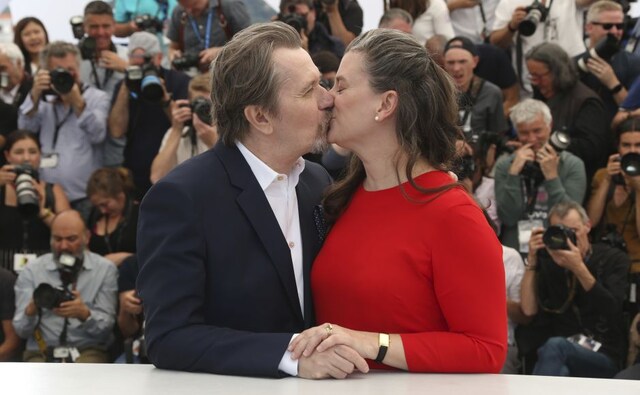 Gary Oldman (L) kisses his wife Gisele Schmidt during a photo call at the 71st international film festival, Cannes. Photo by Joel C Ryan/Invision/AP Gary Oldman (L) kisses his wife Gisele Schmidt during a photo call at the 71st international film festival, Cannes. Photo by Joel C Ryan/Invision/AP