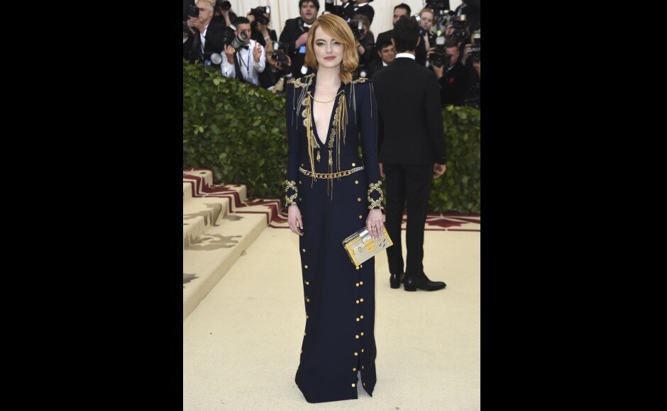 Emma Stone came to Met Gala with designer Nicolas Ghesquiere in a blue velvet dress.Photo by Evan Agostini/Invision/AP Emma Stone came to Met Gala with designer Nicolas Ghesquiere in a blue velvet dress.Photo by Evan Agostini/Invision/AP
