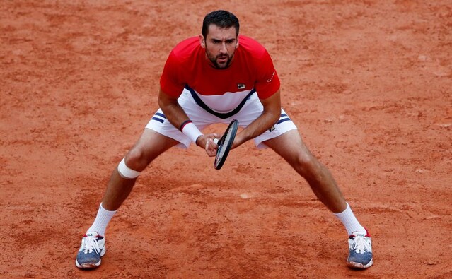 Croatia's Marin Cilic in action during his first round match against Australia's James Duckworth. Reuters Croatia's Marin Cilic in action during his first round match against Australia's James Duckworth. Reuters