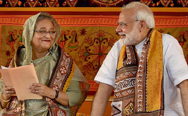 Prime Minister Narendra Modi, along with West Bengal chief minister Mamata Banerjee, met his Bangladesh counterpart Sheikh Hasina on Friday. They attended the convocation ceremony of Visva-Bharati University, where Modi is a chancellor. PTI Prime Minister Narendra Modi, along with West Bengal chief minister Mamata Banerjee, met his Bangladesh counterpart Sheikh Hasina on Friday. They attended the convocation ceremony of Visva-Bharati University, where Modi is a chancellor. PTI