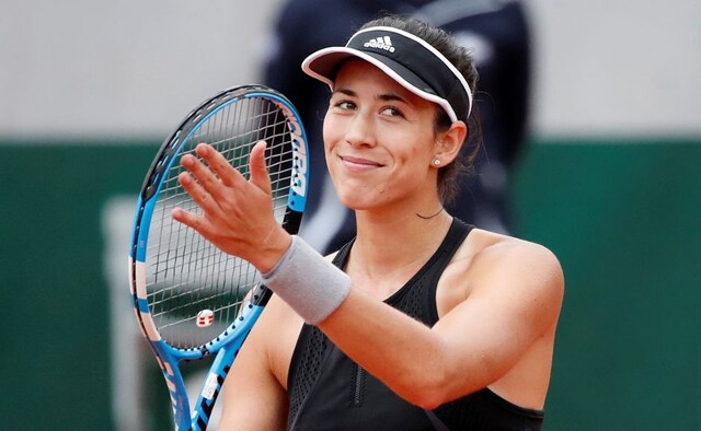 Garbine Muguruza, who won the French Open in 2016, celebrates winning her first round match against Russia's Svetlana Kuznetsova. Reuters Garbine Muguruza, who won the French Open in 2016, celebrates winning her first round match against Russia's Svetlana Kuznetsova. Reuters