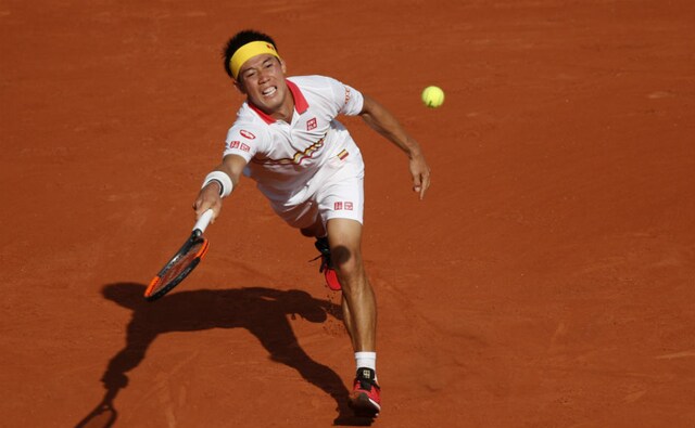 Japan's Kei Nishikori returns a shot against France's Benoit Paire during their second round match. AP Japan's Kei Nishikori returns a shot against France's Benoit Paire during their second round match. AP