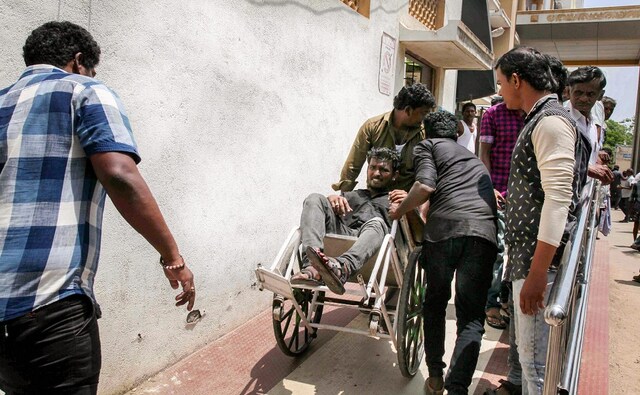 Injured people were taken for treatment at a government hospital following the agitation. Around 65 people were critically injured in the violence. PTI Injured people were taken for treatment at a government hospital following the agitation. Around 65 people were critically injured in the violence. PTI