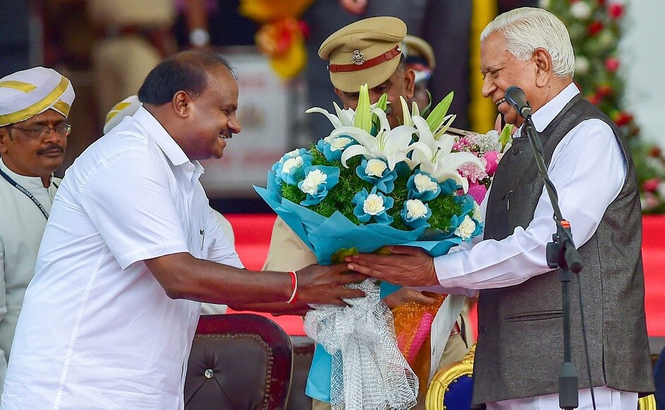 Karnataka Governor Vajubhai Vala greeted Kumaraswamy. The excitement was most shrill among the supporters of “Kumaranna” who shouted slogans of “Kumaranna ki jai”, which was followed by bursting of crackers, singing and dancing to drumbeats. PTI Karnataka Governor Vajubhai Vala greeted Kumaraswamy. The excitement was most shrill among the supporters of “Kumaranna” who shouted slogans of “Kumaranna ki jai”, which was followed by bursting of crackers, singing and dancing to drumbeats. PTI