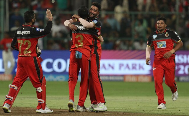 Royal Challengers Bangalore celebrate their narrow 14-run victory over Sunrisers Hyderabad. Courtesy this win, they are still alive in IPL 11. Sportzpics Royal Challengers Bangalore celebrate their narrow 14-run victory over Sunrisers Hyderabad. Courtesy this win, they are still alive in IPL 11. Sportzpics