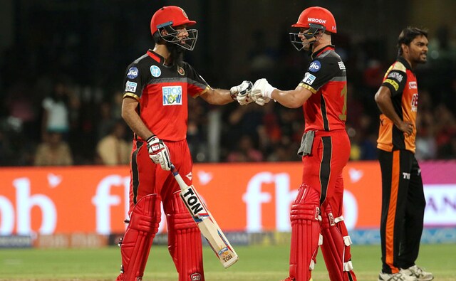 After losing captain Virat Kohli early, AB de Villiers and Moeen Ali both hit half centuries and set the foundation for the hosts with a 107-run stand. Sportzpics After losing captain Virat Kohli early, AB de Villiers and Moeen Ali both hit half centuries and set the foundation for the hosts with a 107-run stand. Sportzpics