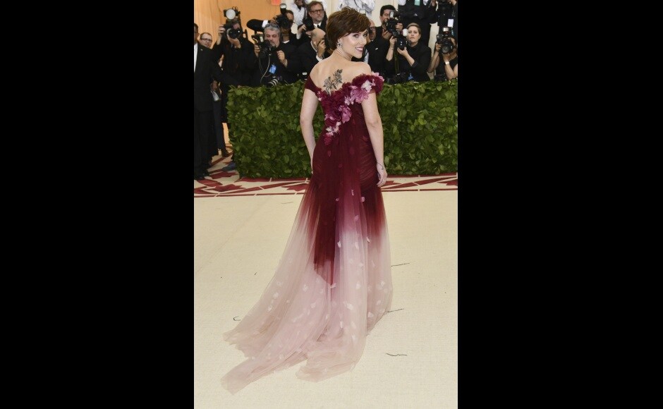 Scarlett Johansson walked Monday's Met Gala carpet in Marchesa — the fashion brand owned by the estranged wife of Harvey Weinstein. Photo by Evan Agostini/Invision/AP Scarlett Johansson walked Monday's Met Gala carpet in Marchesa — the fashion brand owned by the estranged wife of Harvey Weinstein. Photo by Evan Agostini/Invision/AP