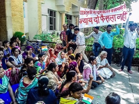 Lack of implementation of labour laws continues to haunt India's textile sector as labourers suffer under exploitative employers Lack of implementation of labour laws continues to haunt India's textile sector as labourers suffer under exploitative employers