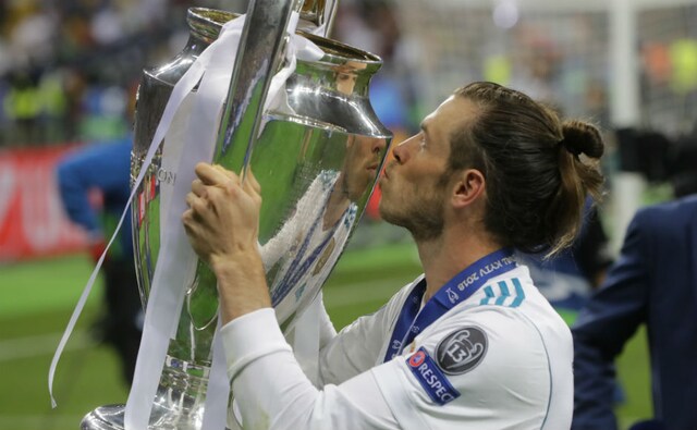 Real Madrid's Gareth Bale kisses the trophy after his match-winning performance against Liverpool. AP Real Madrid's Gareth Bale kisses the trophy after his match-winning performance against Liverpool. AP