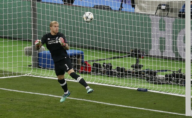 Liverpool goalkeeper Loris Karius looks at the ball as Real Madrid's Gareth Bale scores his side's 3rd goal. AP Liverpool goalkeeper Loris Karius looks at the ball as Real Madrid's Gareth Bale scores his side's 3rd goal. AP