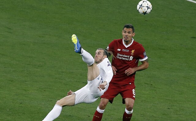 Real Madrid's Gareth Bale, front, scores a stunning bicycle kick to restore his side's lead. AP Real Madrid's Gareth Bale, front, scores a stunning bicycle kick to restore his side's lead. AP