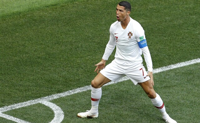 Cristiano Ronaldo celebrates after scoring against Morocco, collecting his fourth goal of the ongoing tournament. AP Cristiano Ronaldo celebrates after scoring against Morocco, collecting his fourth goal of the ongoing tournament. AP