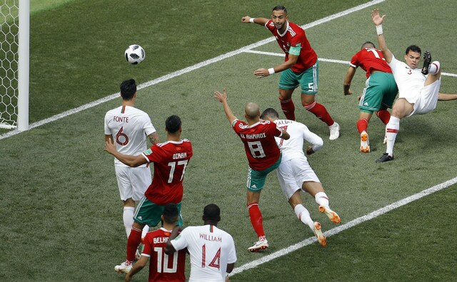 Cristiano Ronaldo heads the ball into the net to get Portugal 1-0 up against Morocco. AP Cristiano Ronaldo heads the ball into the net to get Portugal 1-0 up against Morocco. AP