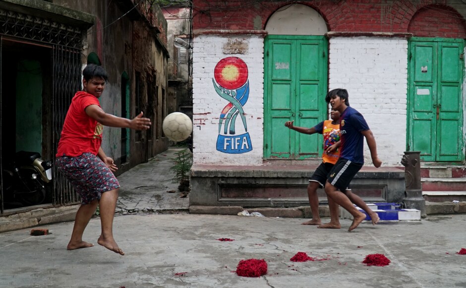 It is said that a bright, lanky teenager named Nagen was fascinated by this sport and he'd watch matches every chance he got. Once, during a game, a ball came flying in his direction, and without a second though, Nagen kicked it back. Nagen — aka Nagendra Prasad Sarbadhikari — is now known as the father of Indian football. He set up a number of football clubs in Bengal. These youngsters pictured here seem to be emulating his spirit. It is said that a bright, lanky teenager named Nagen was fascinated by this sport and he'd watch matches every chance he got. Once, during a game, a ball came flying in his direction, and without a second though, Nagen kicked it back. Nagen — aka Nagendra Prasad Sarbadhikari — is now known as the father of Indian football. He set up a number of football clubs in Bengal. These youngsters pictured here seem to be emulating his spirit.