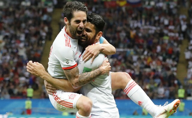 Spain's Diego Costa celebrates with teammate Isco after breaking the deadlock in the second half of their fixture against Iran. AP Spain's Diego Costa celebrates with teammate Isco after breaking the deadlock in the second half of their fixture against Iran. AP