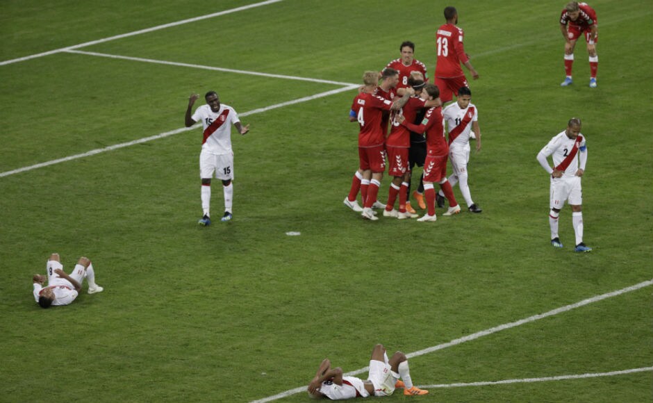 Denmark celebrate their 1-0 win over Peru. AP Denmark celebrate their 1-0 win over Peru. AP