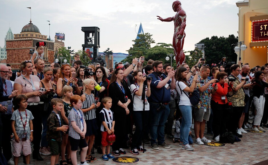 Guests take pictures at the opening show at Disneyland Paris at the launch of the first Avengers-themed season at Disneyland Paris. AP Photo/Francois Mori Guests take pictures at the opening show at Disneyland Paris at the launch of the first Avengers-themed season at Disneyland Paris. AP Photo/Francois Mori