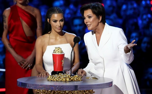 Kim Kardashian West, left, and Kris Jenner accept the best reality series award for Keeping Up With The Kardashians. AP/ Matt Sayles Kim Kardashian West, left, and Kris Jenner accept the best reality series award for Keeping Up With The Kardashians. AP/ Matt Sayles