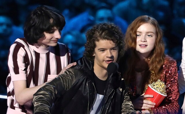 Finn Wolfhard, from left, Gaten Matarazzo and Sadie Sink accept the award for best show for Stranger Things. AP/Matt Sayles Finn Wolfhard, from left, Gaten Matarazzo and Sadie Sink accept the award for best show for Stranger Things. AP/Matt Sayles