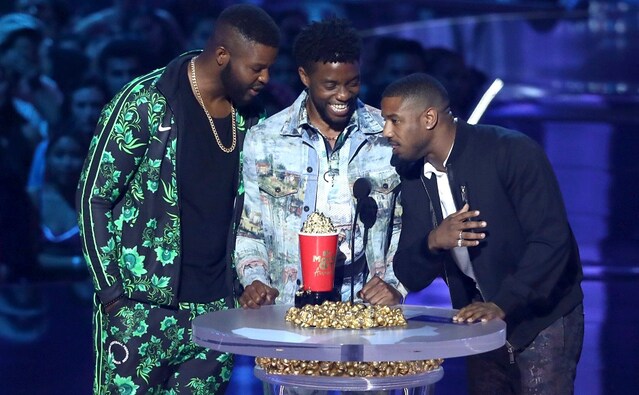 Winston Duke, from left, Chadwick Boseman and Michael B. Jordan accept the award for best movie for Black Panther at the MTV Movie and TV Awards. AP/Matt Sayles Winston Duke, from left, Chadwick Boseman and Michael B. Jordan accept the award for best movie for Black Panther at the MTV Movie and TV Awards. AP/Matt Sayles