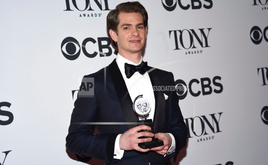 Andrew Garfield bags the award for Best Leading Actor in a play for Angels in America at the Tony Awards. AP/ Evan Agostini Andrew Garfield bags the award for Best Leading Actor in a play for Angels in America at the Tony Awards. AP/ Evan Agostini