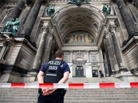 Berlin police shoot Austrian man with knife in cathedral; security officer inadvertently wounded Berlin police shoot Austrian man with knife in cathedral; security officer inadvertently wounded