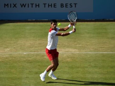Novak Djokovic insists he is not a favourite for Wimbledon despite reaching quarters at Queen's Club Championships Novak Djokovic insists he is not a favourite for Wimbledon despite reaching quarters at Queen's Club Championships