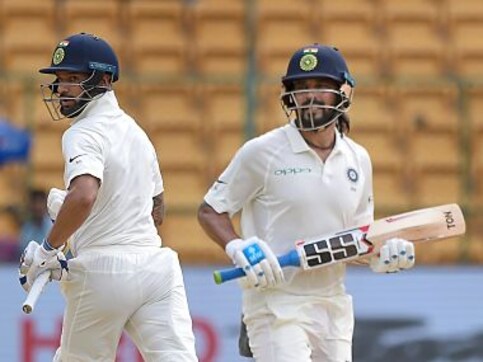India vs Afghanistan: Visitors hit back after Shikhar Dhawan, Murali Vijay smash centuries on rain-curtailed Day 1 India vs Afghanistan: Visitors hit back after Shikhar Dhawan, Murali Vijay smash centuries on rain-curtailed Day 1