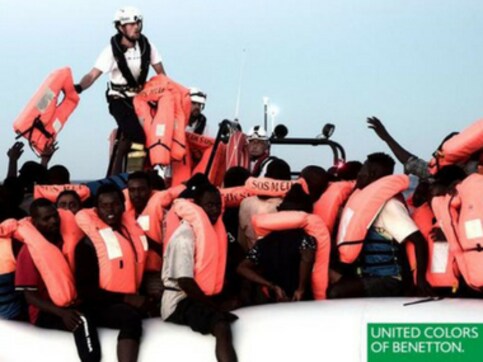 United Colors Benetton slammed by French NGO for featuring photograph of migrants in advertisement United Colors Benetton slammed by French NGO for featuring photograph of migrants in advertisement
