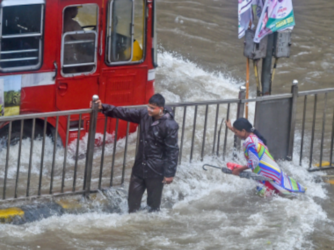 Mumbai rains: Heavy showers continue to lash city for second consecutive day; rail services hit Mumbai rains: Heavy showers continue to lash city for second consecutive day; rail services hit
