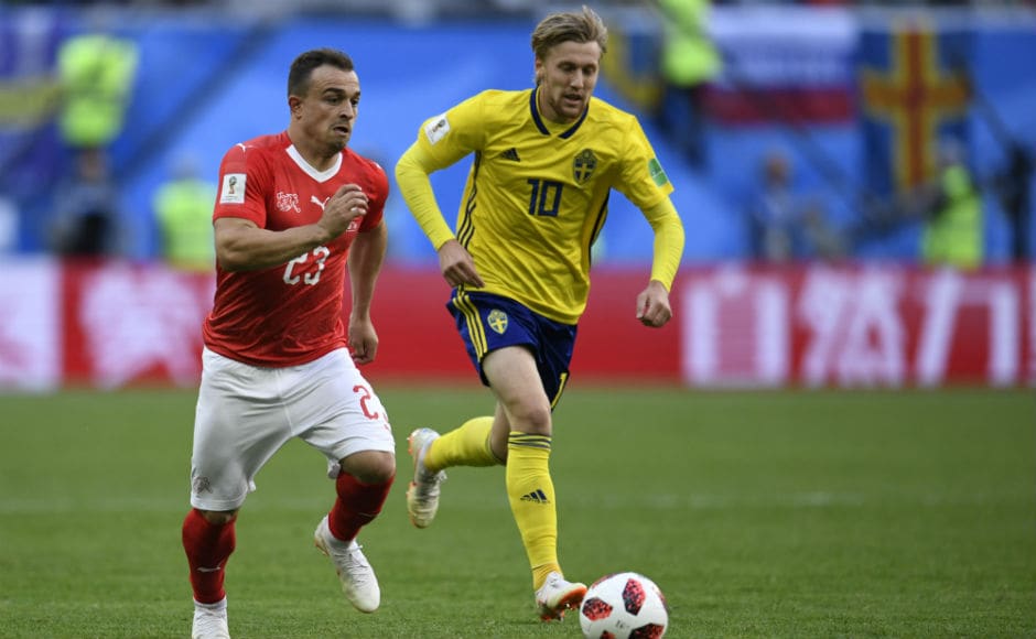 Switzerland's forward Xherdan Shaqiri (L) challenges Sweden's midfielder Emil Forsberg. AFP Switzerland's forward Xherdan Shaqiri (L) challenges Sweden's midfielder Emil Forsberg. AFP