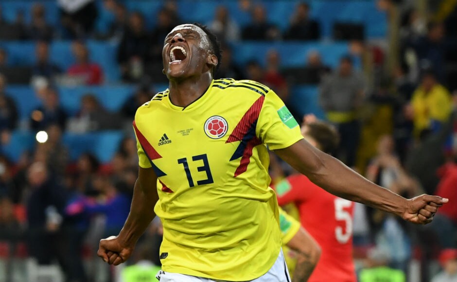 Colombia's defender Yerry Mina celebrates after scoring the equaliser. AFP Colombia's defender Yerry Mina celebrates after scoring the equaliser. AFP