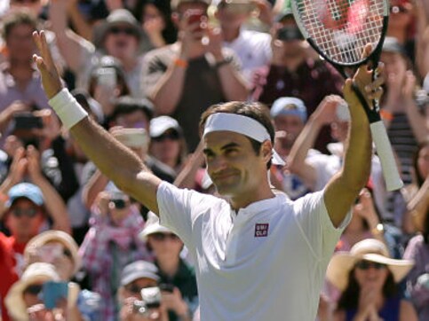 Wimbledon 2018: Defending champion Roger Federer begins campaign with straight-sets victory over Dusan Lajovic Wimbledon 2018: Defending champion Roger Federer begins campaign with straight-sets victory over Dusan Lajovic