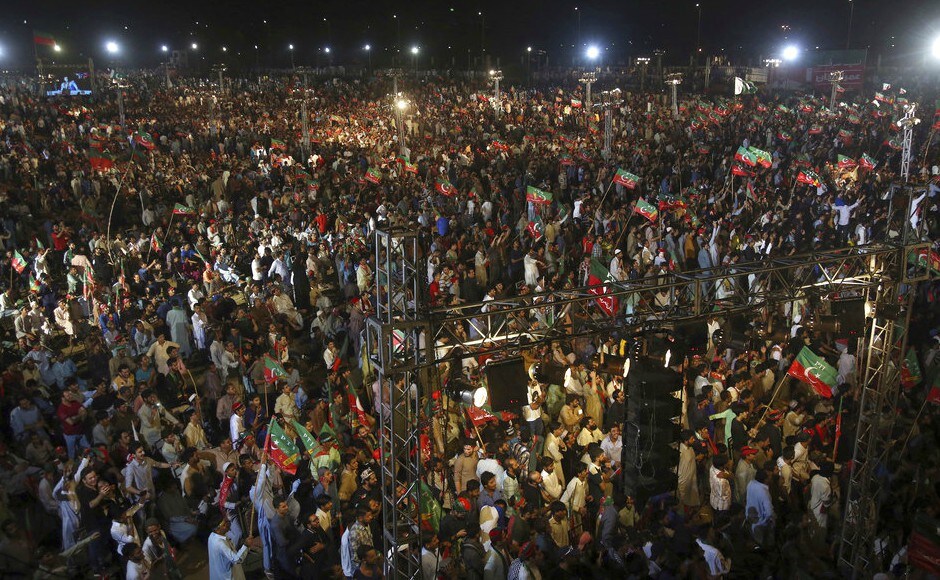 Supporters of Tehreek-e-Insaf party listen the speech of their leader Imran Khan during an election campaign rally in Karachi, Pakistan. According to the electoral rolls published by the ECP, 105.96 million voters will be able to cast their vote in the upcoming elections. AP Supporters of Tehreek-e-Insaf party listen the speech of their leader Imran Khan during an election campaign rally in Karachi, Pakistan. According to the electoral rolls published by the ECP, 105.96 million voters will be able to cast their vote in the upcoming elections. AP
