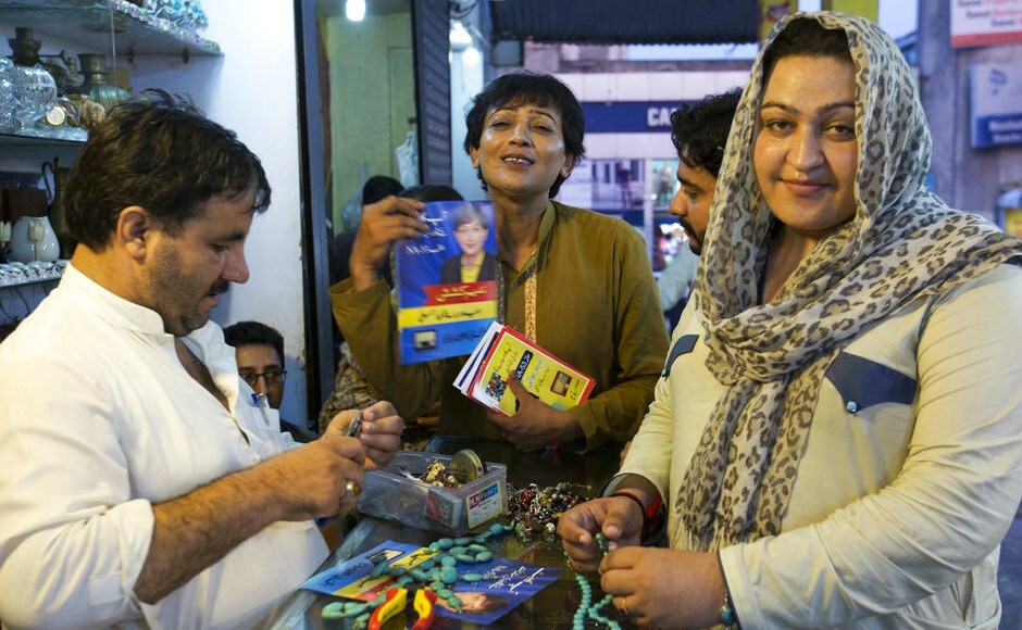 Pakistani transgender election candidate Nadeem Kashish (centre) visits shops during her election campaign, in Islamabad. The Pakistani election commission has for the first time allowed the transgender community to participate in an election. AP Pakistani transgender election candidate Nadeem Kashish (centre) visits shops during her election campaign, in Islamabad. The Pakistani election commission has for the first time allowed the transgender community to participate in an election. AP