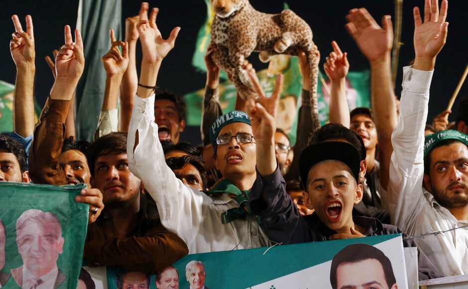 PML-N supporters during an election campaign rally in Rawalpindi. AP PML-N supporters during an election campaign rally in Rawalpindi. AP