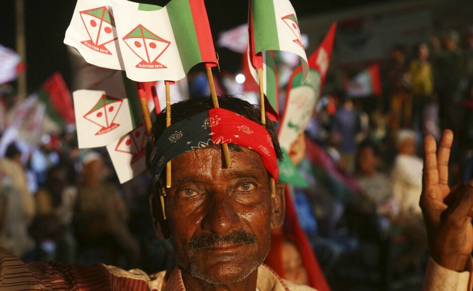 A supporter of Pakistani political party Muttahida Quami Movement (MQM) attends an election rally in Karachi, Pakistan. AP A supporter of Pakistani political party Muttahida Quami Movement (MQM) attends an election rally in Karachi, Pakistan. AP
