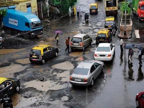 Potholes in Mumbai: Woman sustains head injuries after falling off scooter in Tardeo, condition stable says doctor
