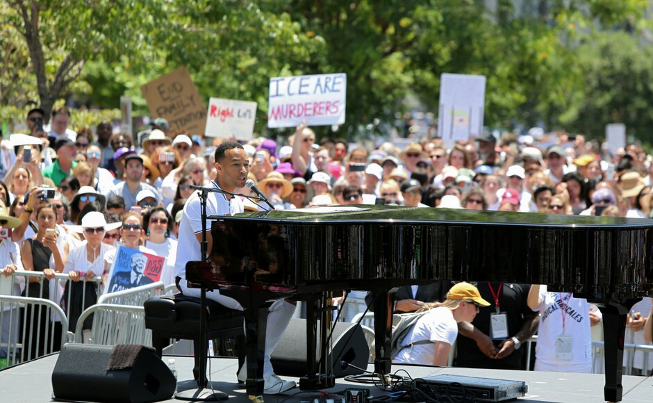 Singer John Legend joined the protests in Los Angeles. He asked the people to resist the temptation to disengage. Reuters Singer John Legend joined the protests in Los Angeles. He asked the people to resist the temptation to disengage. Reuters