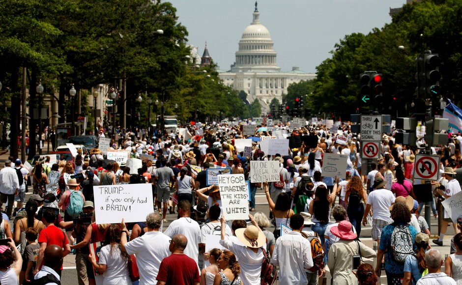 Thousands marched towards the US Capitol and raised slogans like' I do care' referring to Melania Trump's jacket which caused controversy. Reuters Thousands marched towards the US Capitol and raised slogans like' I do care' referring to Melania Trump's jacket which caused controversy. Reuters
