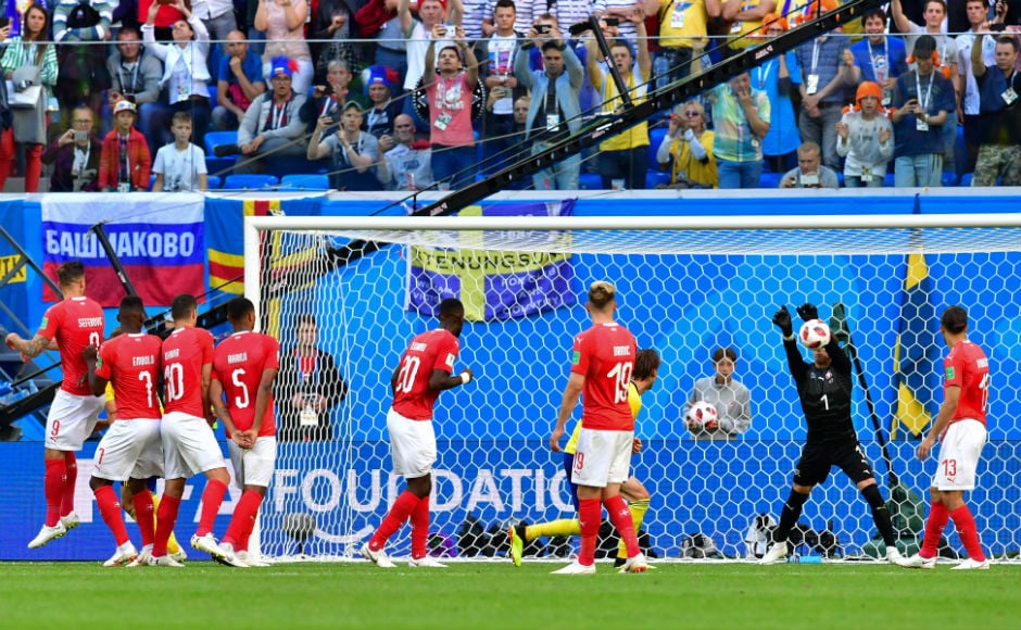 Switzerland's goalkeeper Yann Sommer (2nd R) makes a save to deny Sweden. AFP Switzerland's goalkeeper Yann Sommer (2nd R) makes a save to deny Sweden. AFP