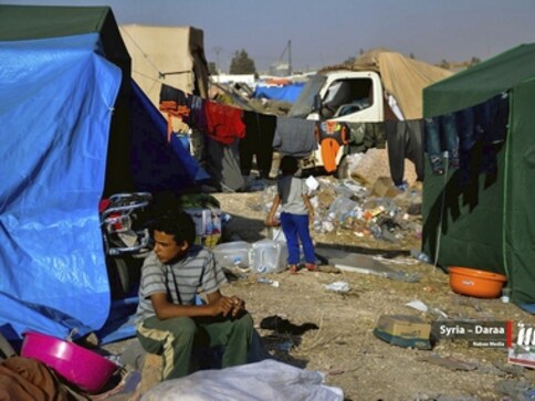 Thousands of refugees return to Syria after Russian mediators negotiate ceasefire with militias