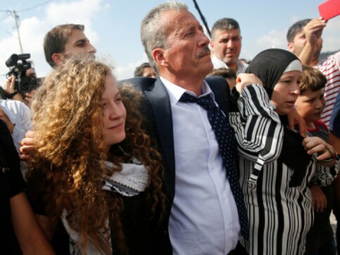 Palestinian teen Ahed Tamimi released from prison after eight months; jailed for slapping two Israeli soldiers Palestinian teen Ahed Tamimi released from prison after eight months; jailed for slapping two Israeli soldiers