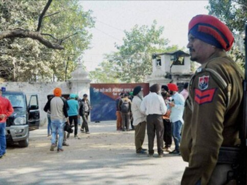 Punjab: Police officer suspended for 'misconduct' after touching minister's feet seeking favour Punjab: Police officer suspended for 'misconduct' after touching minister's feet seeking favour