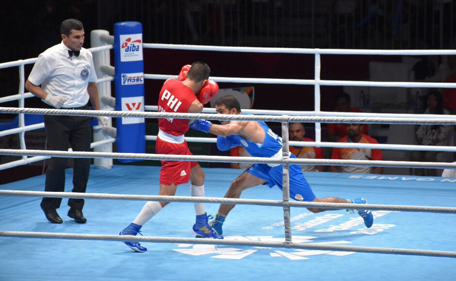 India's Amit Panghal registered an impressive victory in the Men's Light Fly (49kg) semi-finals to reach the finals, where he stands a chance of winning a gold medal. Twitter@BFI_official India's Amit Panghal registered an impressive victory in the Men's Light Fly (49kg) semi-finals to reach the finals, where he stands a chance of winning a gold medal. Twitter@BFI_official
