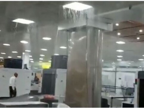 Leaky roof gives way to downpour in Guwahati airport baggage screening area; video goes viral after rattled flyers share it online Leaky roof gives way to downpour in Guwahati airport baggage screening area; video goes viral after rattled flyers share it online