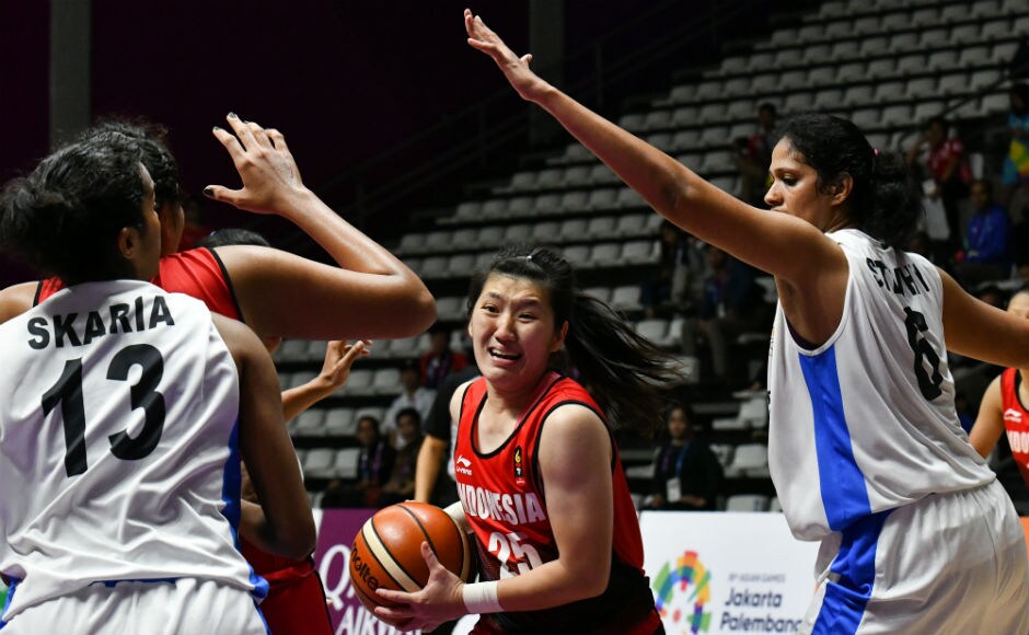 India suffered a narrow 66-69 loss to hosts Indonesia in the women's 5x5 basketball event. AFP India suffered a narrow 66-69 loss to hosts Indonesia in the women's 5x5 basketball event. AFP