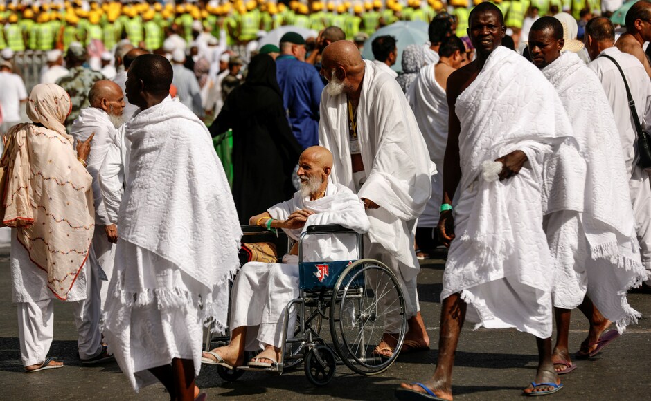 Muslim pilgrims gather before the Friday prayer at the Grand mosque ahead of annual Haj pilgrimage. Najwa, 59, a citizen of Tunisia and one of the pilgrims said, "I came for umrah (minor pilgrimage) in 2007 and today after 10 years of registering and waiting, I am here. I cannot describe the feeling. I cry every day." Reuters/ Zohra Bensemra Muslim pilgrims gather before the Friday prayer at the Grand mosque ahead of annual Haj pilgrimage. Najwa, 59, a citizen of Tunisia and one of the pilgrims said, "I came for umrah (minor pilgrimage) in 2007 and today after 10 years of registering and waiting, I am here. I cannot describe the feeling. I cry every day." Reuters/ Zohra Bensemra